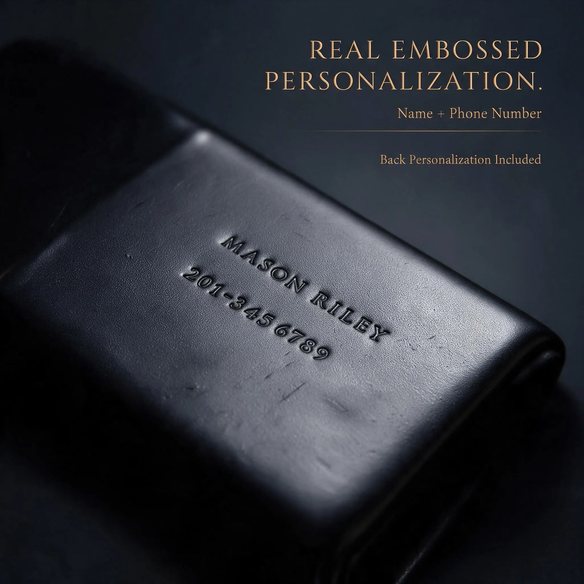 Real embossed name and phone number example on the leather luggage tag back
